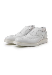 White leather shoes with brogue detailing, featuring a smooth finish, round toe, and a white rubber sole. Five eyelet lace-up design.