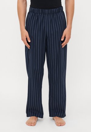 Marineblauwe gestreepte broek met een elastische tailleband, voorzien van dunne witte verticale strepen, een losse pasvorm en een soepele, lichte stof.