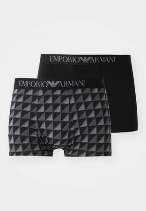 Deux paires de boxers pour hommes ; l'une est unie en noir, l'autre présente un motif géométrique gris avec des accents noirs. Ceinture élastique avec logo.