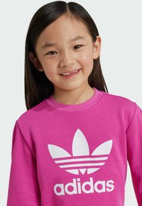 adidas Originals ADICOLOR CREW KIDS - Tuta - semi lucid fuchsia