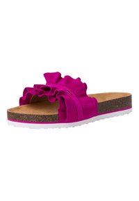 Fuchsia slide sandals with ruffled upper, cork base, and white rubber outsole featuring a textured grip. Accents in contrasting colors.