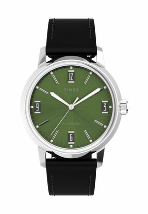 Timex automatic watch with a green textured dial, silver-tone indices and hands, black leather strap, and date display at 6 o'clock.