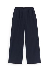 Pantalon large bleu marine avec taille élastique, fermeture par bouton et design simple, posé à plat sur fond blanc.