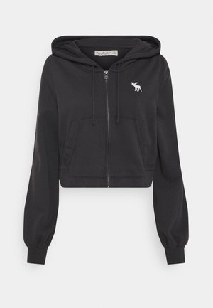 Sweat à capuche court noir zippé avec poches avant, cordon à la capuche, poignets côtelés et petit logo orignal blanc sur la poitrine gauche.