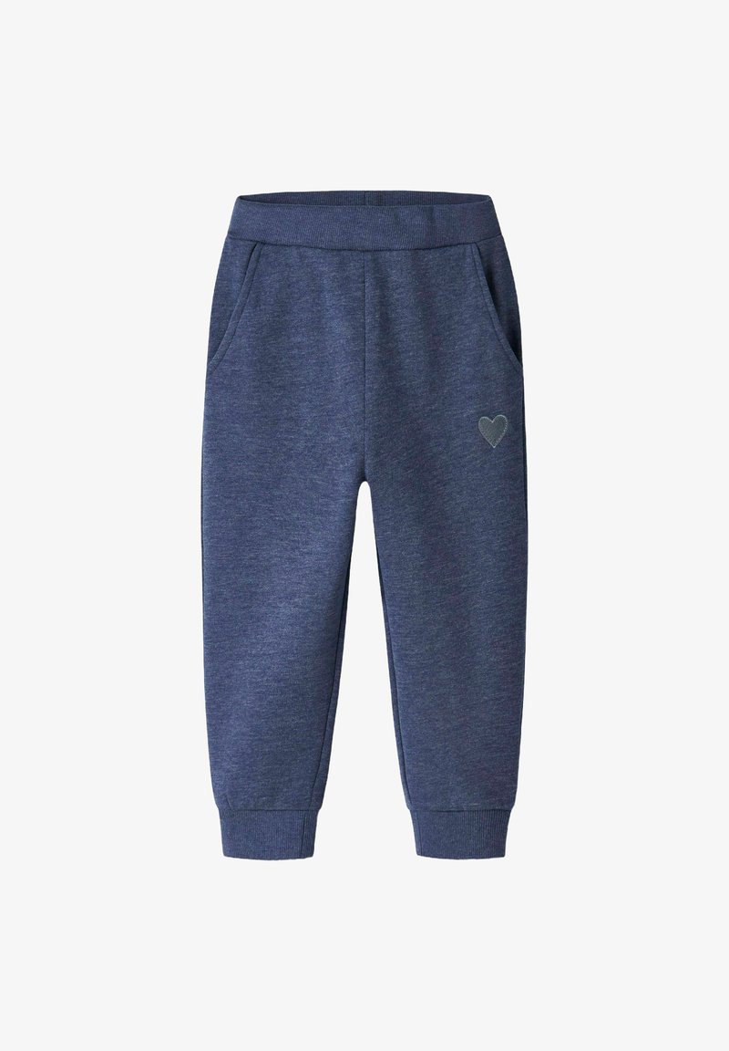 Marineblå sweatpants lavet af bomuldsblanding. Har elastisk talje, to sidelommer og lille hjertebroderi på venstre ben.