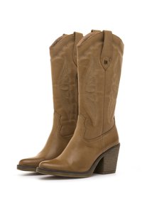 Stivali da cowboy in pelle marrone con design impresso, punta affilata e tacco impilato. Presentano cuciture decorative e linguette per facilitarne l'indossamento.