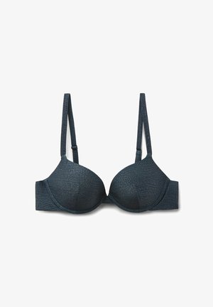 Soutien-gorge bleu foncé avec une surface lisse et texturée présentant un motif crocodile, armatures pour le maintien et bretelles réglables.