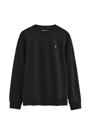 Schwarzes Langarmshirt mit Rundhalsausschnitt, Rippbündchen an Ärmeln und Saum, versehen mit einem kleinen weißen Polospieler-Logo auf der linken Brust.