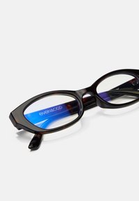 Schwarz schildpattfarbene Brille mit ovalen Gläsern. Hat ein blaues Innenleben mit der Marke "even&odd" aufgedruckt. Glatte Kunststoffoberfläche, stilvolles Design.