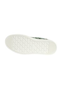 White rubber shoe sole with a textured pattern featuring diamond shapes and lines. Designed for grip and durability.