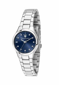 Orologio in acciaio inossidabile argentato con quadrante rotondo blu, indicatori simili a diamanti e bracciale in metallo lucido. Presenta una corona e un logo a ore 12.