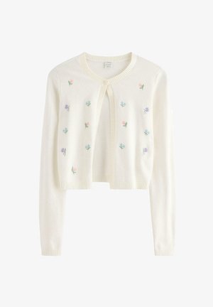 Hvid kort cardigan med lange ærmer, rund hals, enkelt knaplukning og små broderede pastelfarvede blomster på forsiden.