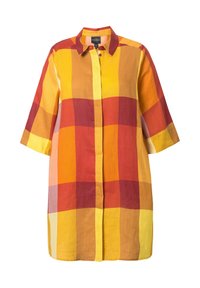Camicia a maniche corte con design a quadri nei colori rosso brillante, arancione, giallo e marrone. Realizzata in tessuto leggero, presenta una chiusura con bottoni davanti.