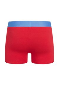 Red cotton boxer briefs with a blue elastic waistband. Features a smooth texture and a mid-thigh length cut. No additional patterns or accents.