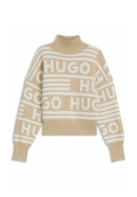 Beige trui met een hoge hals, voorzien van crèmewitte horizontale strepen en "HUGO" herhaald in grote blokletters. Gebreide textuur, relaxte fit.