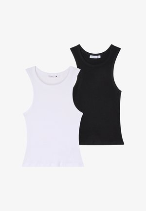 Due canotte in bianco e nero. Tessuto in cotone, texture a coste, scollatura rotonda e design senza maniche. Etichette visibili all'interno delle canotte.