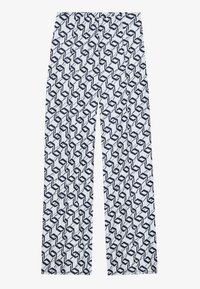Pantalons larges blancs avec un motif géométrique bleu marine, dotés d'une texture douce et d'une taille élastique pour un ajustement confortable.