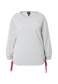 Felpa grigia con maniche lunghe, scollatura rotonda e lacci rosa sui lati per la regolazione. Tessuto morbido e strutturato.