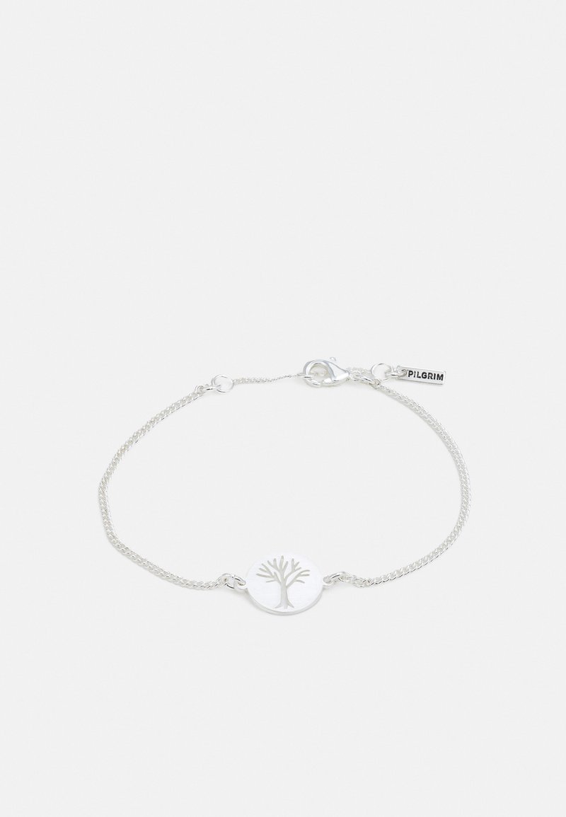 Pulseira de prata com uma corrente delicada, apresentando um pingente circular com um design de árvore e uma etiqueta de logotipo. Design simples e minimalista.