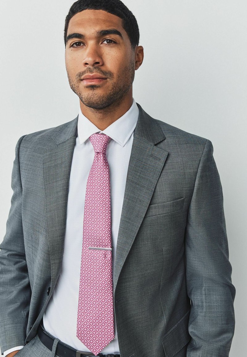 grey dress shirt pink tie Mens Pink and Grey Floral Tuxedo with Satin Trim â€“ Prom and Wedding Suit  with Bow Tie and Flower Pin main image 1