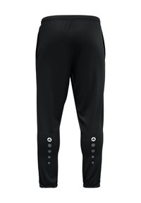 Pantalons de sport noirs avec un design fuselé, comportant des poches latérales et des motifs circulaires près de la cheville. Matière lisse et légère.