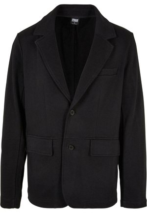 Schwarze Blazerjacke aus weichem Stoff mit einem Reverskragen, zwei Fronttaschen und einer Zwei-Knopf-Verschluss. Klassisches Design mit minimaler Textur.