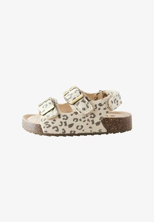 Leopardenprint-Sandalen mit zwei verstellbaren Schnallen, aus weichem Wildleder-ähnlichem Material, mit einer Korksohle und einer strukturierten braunen Laufsohle.