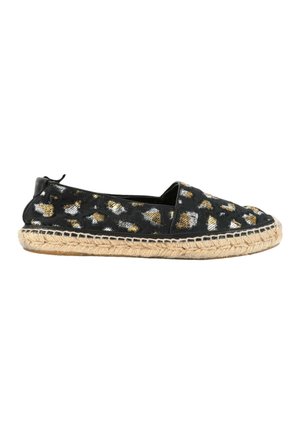 Chaussure plate espadrille noire avec taches léopard métalliques dorées et argentées et semelle en jute tressée.