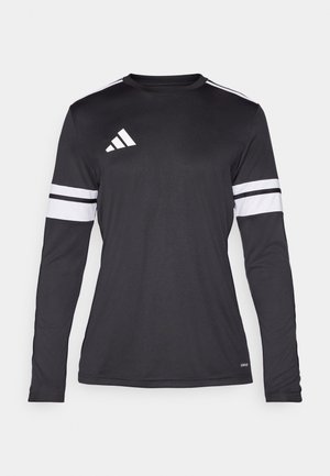 Camisa deportiva de manga larga negra con acentos de tres rayas blancas en las mangas y un logo blanco en el pecho. Elaborada con una tela suave y transpirable.