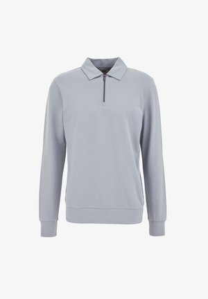 Világosszürke pulóver gallérral és rövid cipzárral. Textúrált anyagból készült, hosszú ujjú és bordás mandzsettákkal, valamint aljjal rendelkezik.