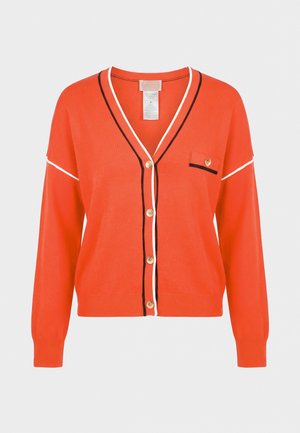Langermet oransje cardigan med V-hals, knapper foran, og sort-hvite kantdetaljer langs kantene samt en liten knappet brystlomme.