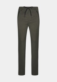 Pantaloni jogger aderenti di colore verde scuro con una finitura texturizzata, vita elastica con cordino e due tasche laterali con zip.