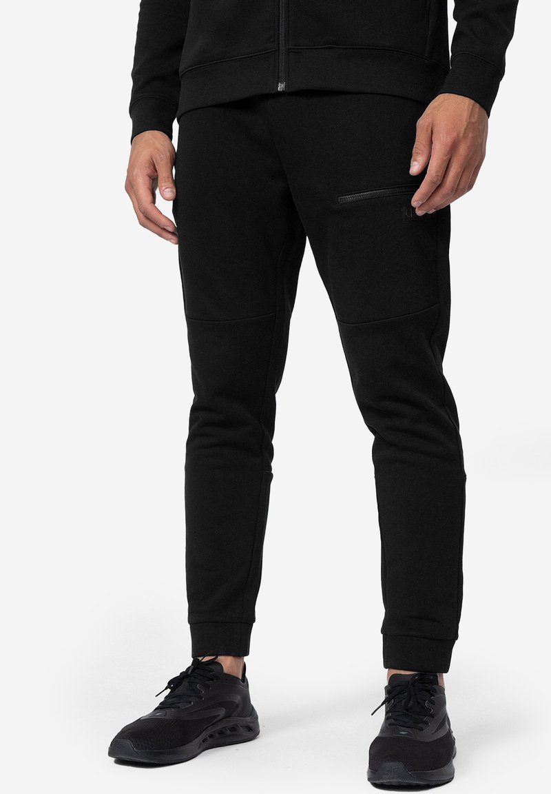 4F CAS Tracksuit bottoms deep black/black Zalando.ie