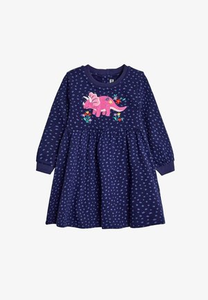Námořnická modrá šaty s dlouhými rukávy, s aplikací růžového dinosaura a květinovou výšivkou na hrudi, texturovaný vzor s puntíky.
