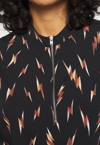 Noisy May Pusero - black