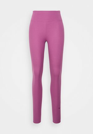 Leggings violets en tissu extensible, dotés d'une taille haute et d'un design ajusté. Le logo Nike accentue la partie inférieure de la jambe.