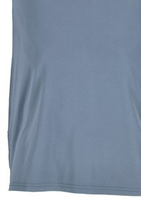Hellblaues Sport-T-Shirt aus atmungsaktivem, strukturiertem Stoff mit kleinen Perforationen, im entspannten Schnitt und mit genähten Säumen.