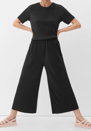 Spodnie materiałowe