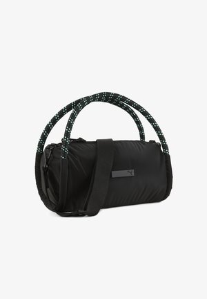 Geantă neagră din nylon cu mânere rotunjite acoperite cu țesătură cu model. Include o curea de umăr detașabilă și o placă cu logo. Textură netedă.