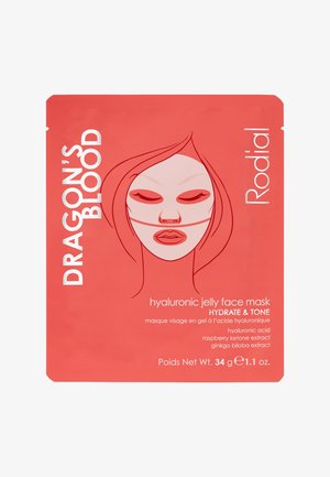 Il packaging rosso presenta un'illustrazione stilizzata di un volto con dettagli minimi. Il testo include "Dragon's Blood" e la descrizione del prodotto. Peso netto di 34g.