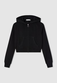 Felpa nera cropped con zip, tasche frontali e cappuccio, mostrata distesa su uno sfondo grigio chiaro.