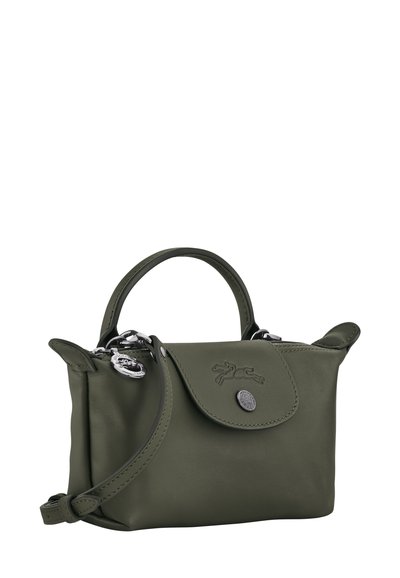 Green leather handbag with a rounded shape, short handles, and a detachable shoulder strap. Features a flap closure and embossed logo detail.