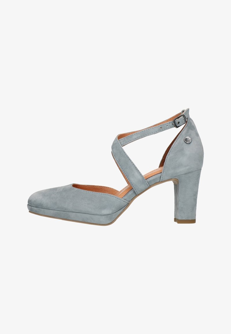 Light blue suede high-heel shoe with a square toe, crossed ankle strap, and a rounded heel. Features a small decorative accent on the side.