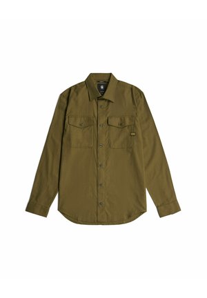 Chemise pour homme à manches longues de couleur vert olive, avec deux poches poitrine boutonnées et un petit patch logo noir et jaune sur la poche gauche.