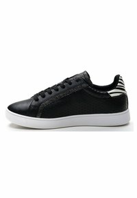 Black sneakers with leather and perforated material, featuring a textured side panel and metallic accents, and a white rubber sole.