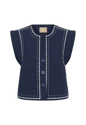 Gilet matelassé bleu marine avec des emmanchures larges, orné de surpiqûres blanches en zigzag et six boutons sur le devant. Texture lisse, sans capuche.
