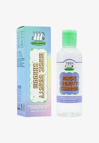 Gjennomsiktig plastflaske med grønt lokk, merket "Magic Beauty Shroom." Følges av en fargerik boks med tegneseriemotiv av kaniner og lekent tekst.