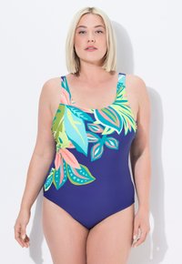 Eén stuk badpak met een marineblauwe basis en levendige tropische bloemenpatronen in groen, roze en turquoise. Zachte stof, brede banden.
