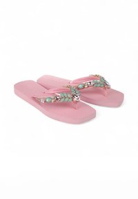 Roze teenslippers met een gestructureerde voetbed, voorzien van een juweelversiering in turquoise en goud op de banden.