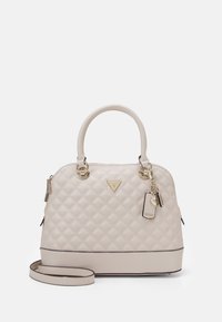Quilted beige handbag with gold hardware, top handles, detachable shoulder strap, and logo detail. Smooth texture with structured shape.